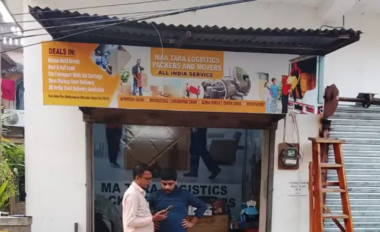 Professional movers relocating office furniture and equipment